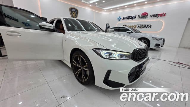BMW 3 Series 2023 — ფოტო 2/13