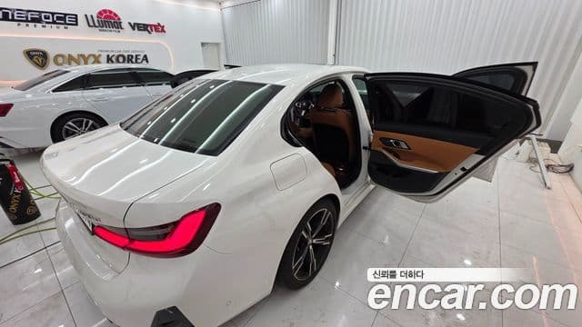 BMW 3 Series 2023 — ფოტო 6/13