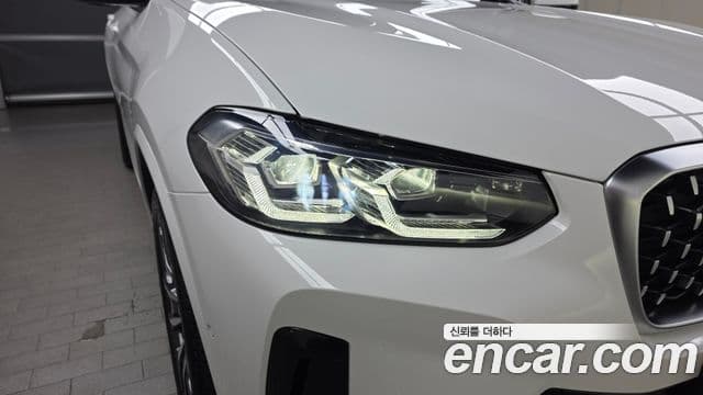 BMW X4 2024 — Photo 13/34