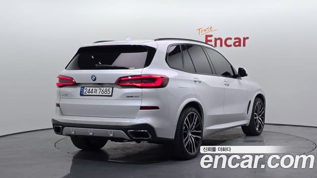 BMW X5 2019 — ფოტო 1/20