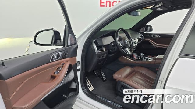BMW X5 2019 — ფოტო 8/20