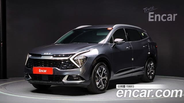Kia Sportage 2023 — ფოტო 1/20