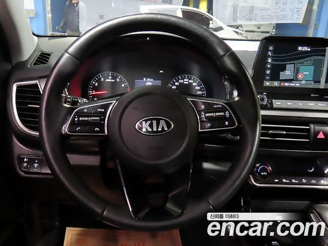 Kia Seltos 2021 — ფოტო 11/20