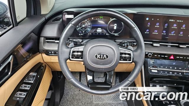 Kia Carnival 2021 — ფოტო 13/20