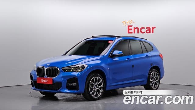 BMW X1 2022 — ფოტო 1/20