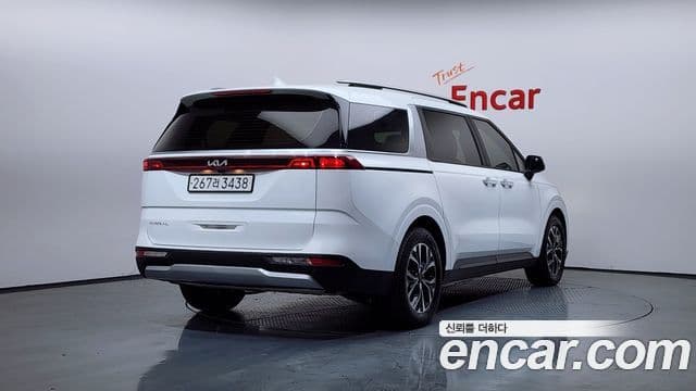 Kia Carnival 2023 — ფოტო 1/20