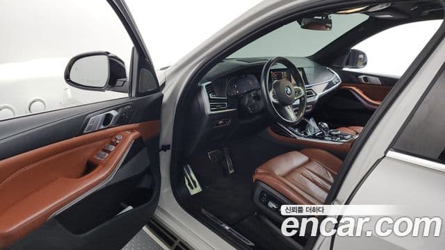 BMW X7 2021 — ფოტო 10/20