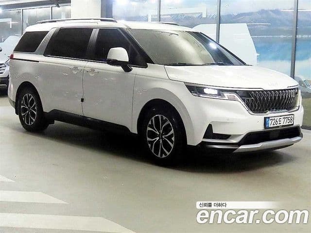 Kia Carnival 2023 — ფოტო 1/20