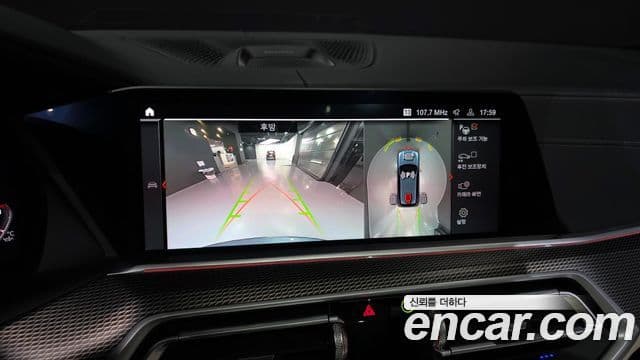 BMW X5 2021 — ფოტო 15/20