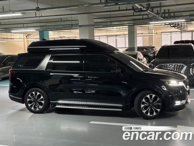 Kia Carnival 2021 — ფოტო 6/20