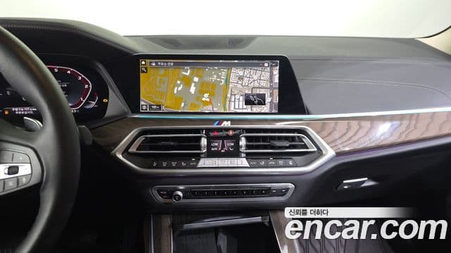 BMW X5 2023 — ფოტო 14/20