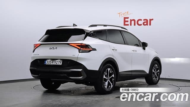 Kia Sportage 2021 — Фото 2/20