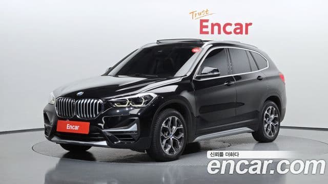 BMW X1 2021 — Şəkil 1/20