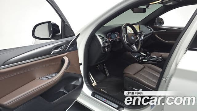 BMW X4 2023 — ფოტო 10/20