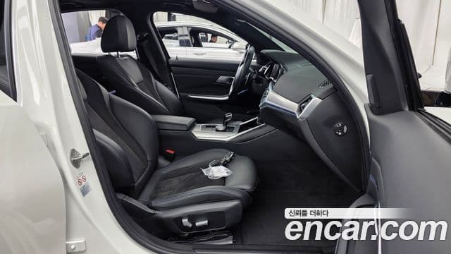 BMW 3 Series 2022 — фото 11 из 20