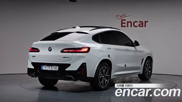 BMW X4 2022 — Фото 2/20