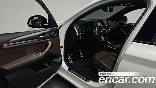 BMW X4 2022 — Фото 10/20