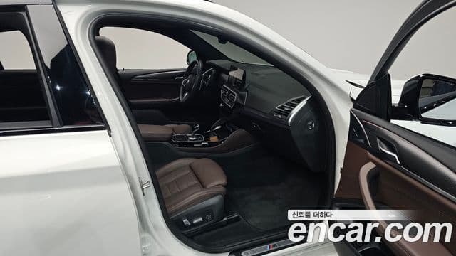 BMW X4 2022 — Фото 11/20