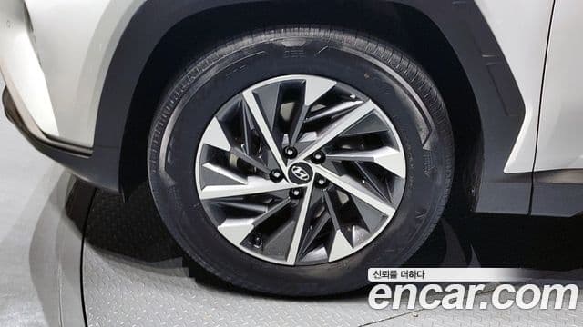 Hyundai Tucson Hybrid 2022 — ფოტო 9/20