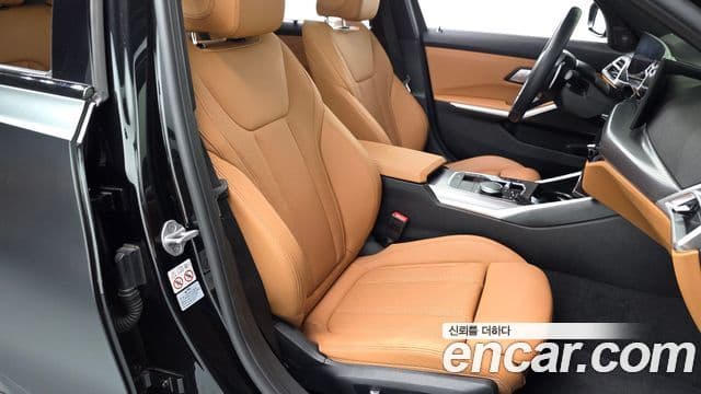 BMW 3 Series 2024 — ფოტო 8/20