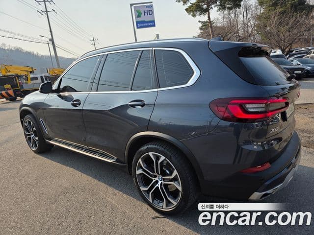 BMW X5 2022 — ფოტო 6/20