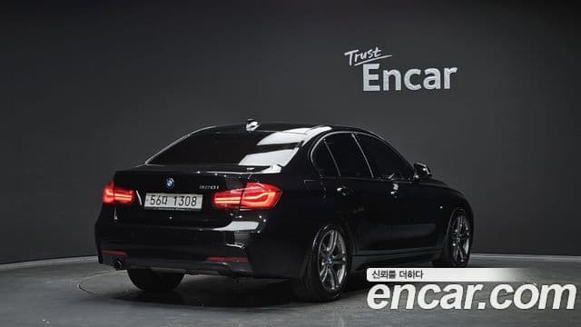 BMW 3 Series 2018 — фото 2 из 20