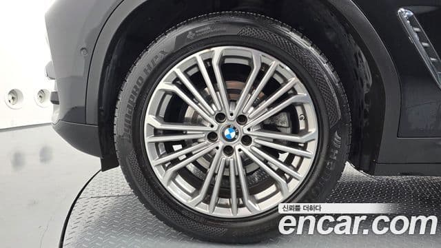 BMW X3 2021 — ფოტო 4/20
