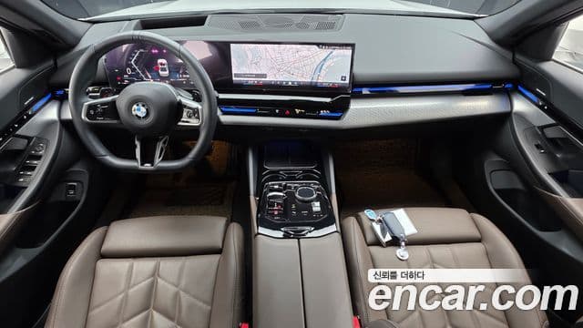 BMW 5 Series 2024 — Фото 10/20