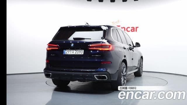 BMW X5 2021 — ფოტო 14/20