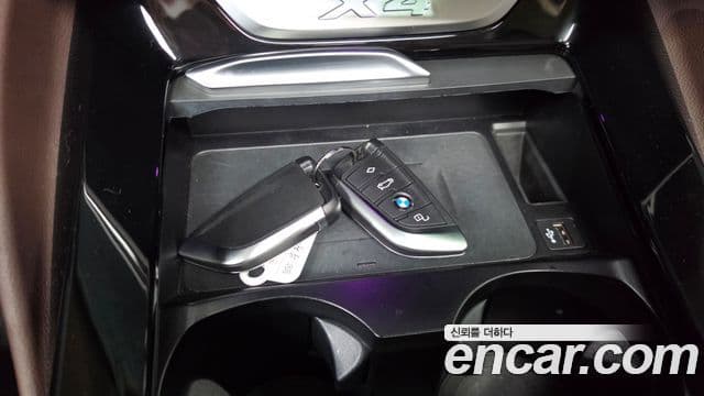 BMW X4 2022 — ფოტო 15/20