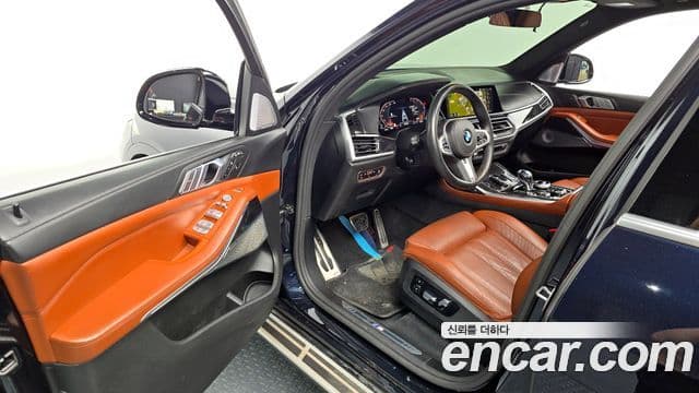 BMW X7 2021 — ფოტო 10/20