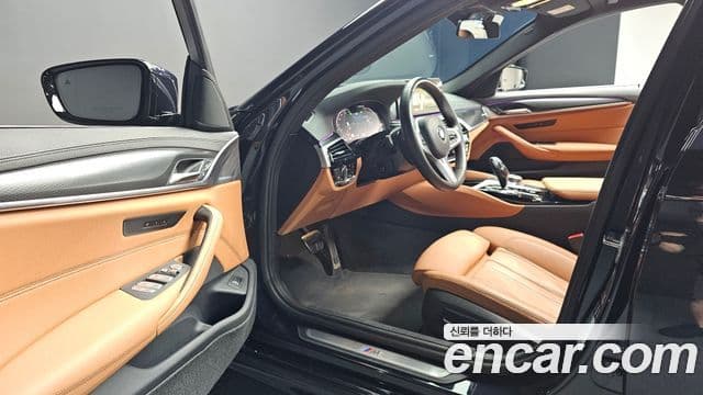 BMW 5 Series 2023 — Фото 10/20
