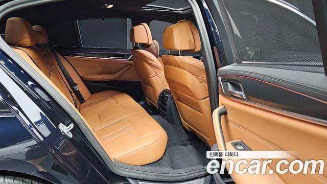 BMW 5 Series 2023 — Фото 12/20