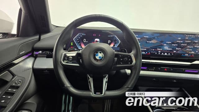 BMW 5 Series 2023 — ფოტო 15/20