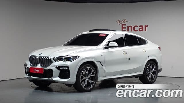BMW X6 2021 — Фото 1/20