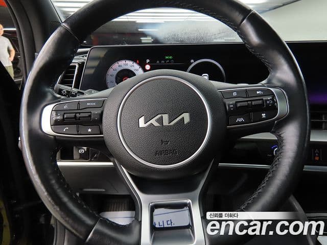 Kia Sportage 2021 — ფოტო 6/20