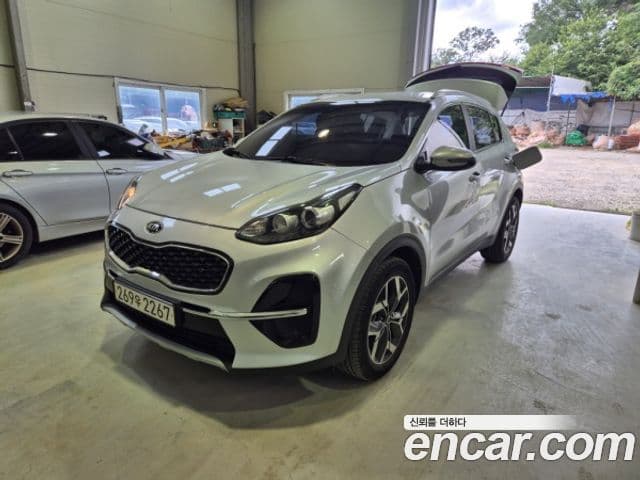 Kia Sportage The Bold 2021 — ფოტო 1/10