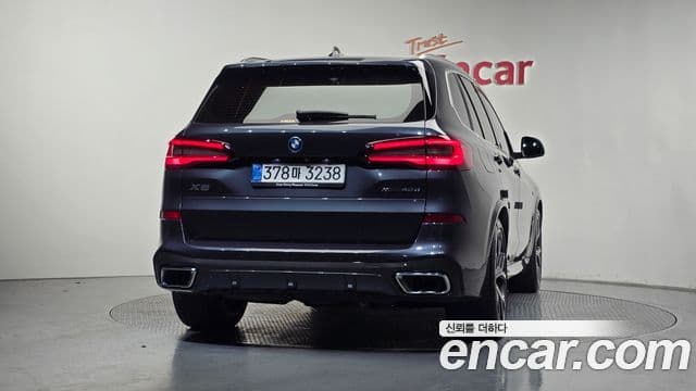 BMW X5 2022 — ფოტო 4/20