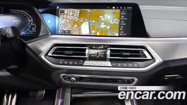 BMW X5 2021 — ფოტო 15/20