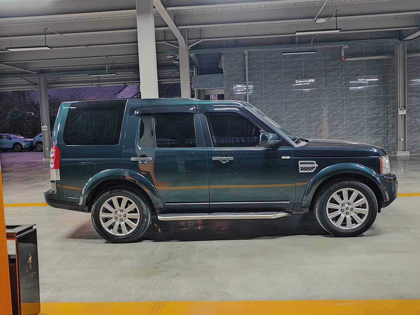 Land Rover Discovery 2012 — Фото 6/11