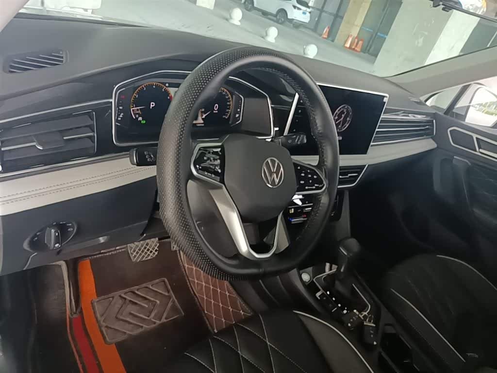 Volkswagen Tiguan L 2023 — Фото 11/20