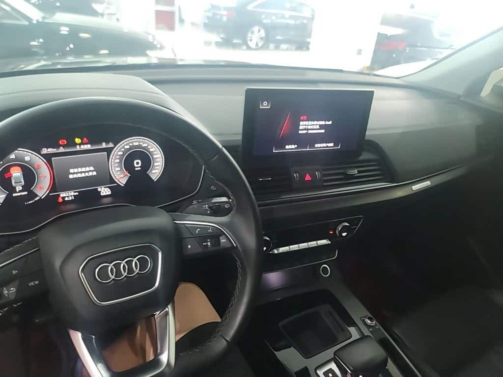 Audi Q5L 2022 — Фото 10/20