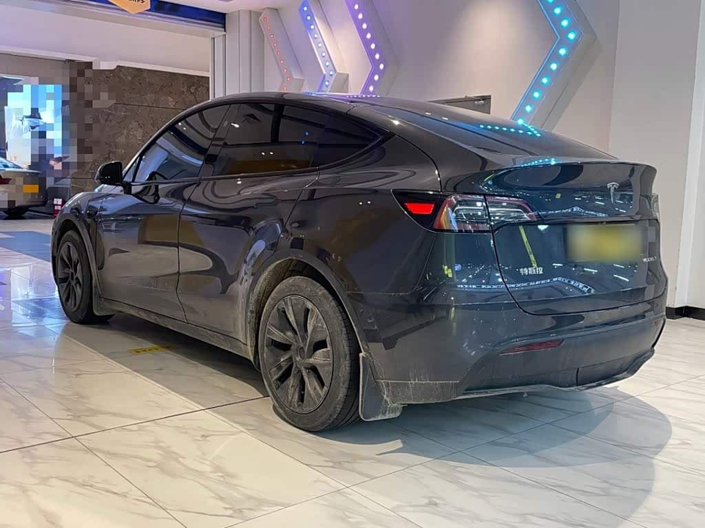 Tesla Model Y 2024 — Фото 5/20