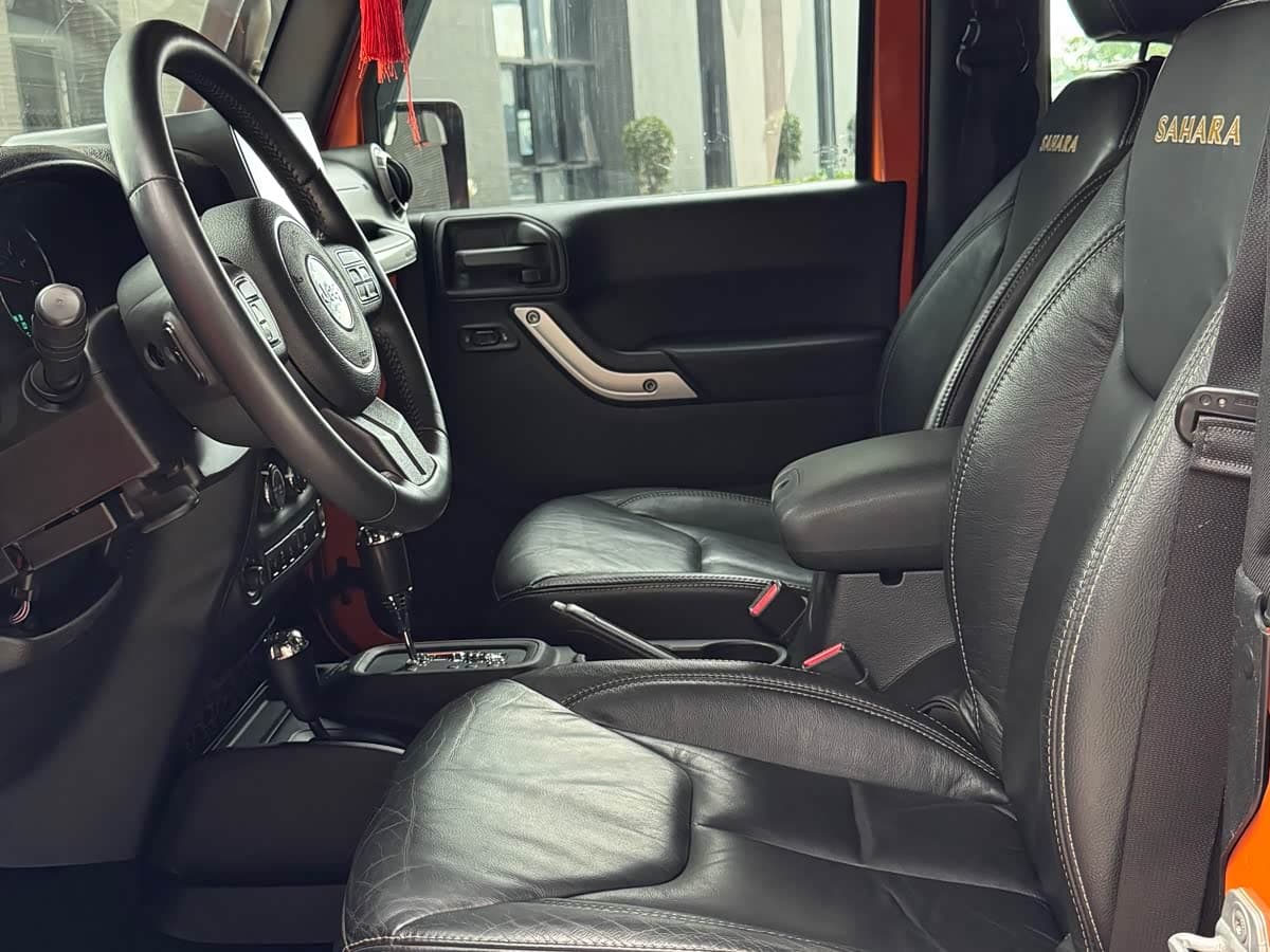 Jeep Wrangler 2013 — Фото 12/18