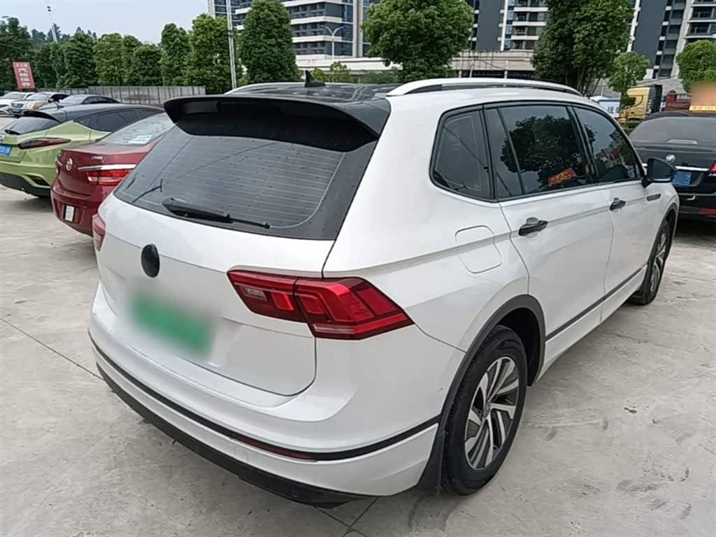 Volkswagen Tiguan L PHEV 2021 — Фото 7/20