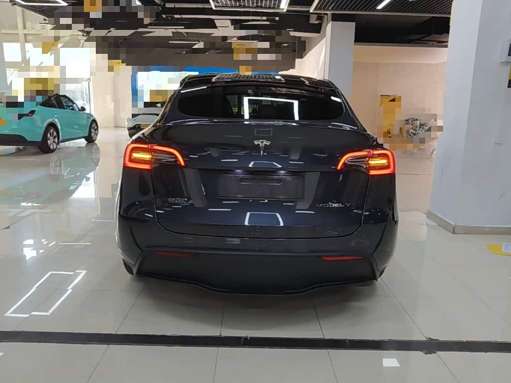 Tesla Model Y 2024 — Фото 6/20