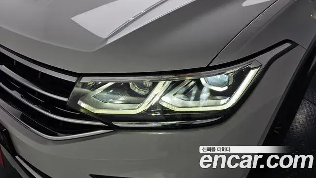 Volkswagen Tiguan 2021 — ფოტო 18/33