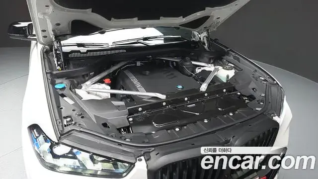 BMW X5 2025 — ფოტო 26/32