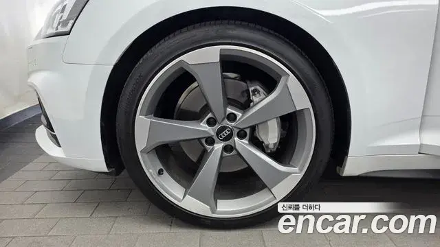 Audi A5 2019 — ფოტო 28/36