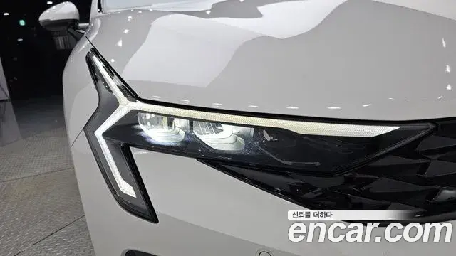 Kia K5 2024 — ფოტო 26/33
